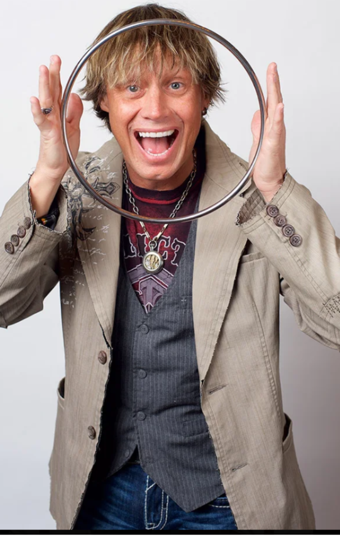Magic Man Rusty holding a hoop