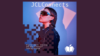 Photo of a person with that is looking at the words JCL connects